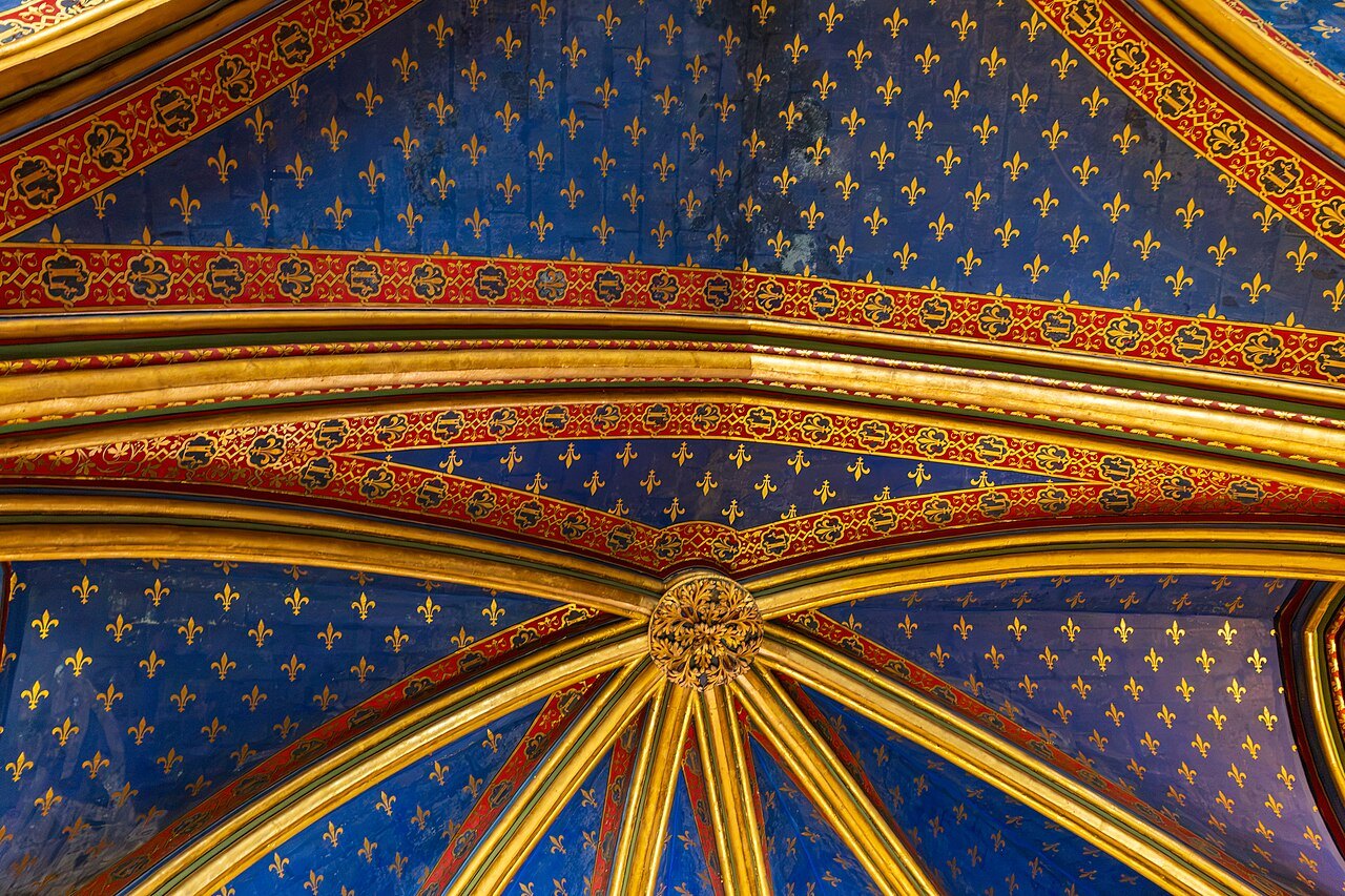 The gilded ribs and starry blue vault of the Sainte-Chapelle's lower chapel